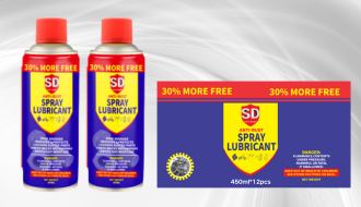 Silicone spray lubricant bottle with clear liquid, on wooden surface with tools
